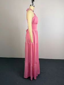 Elegant pink halter pleated high waist maxi dress for women shown from a side view
