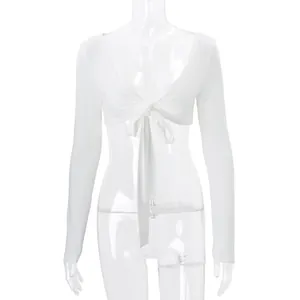 Elegant white long sleeve tie-front shrug bolero for women shown on a clear mannequin