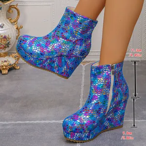 Vibrant multi-color patterned wedge platform ankle boots featuring a side zipper design