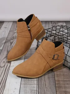 Stylish tan pointed toe women's ankle boots with block heel and side zipper detail.