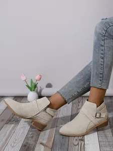 Stylish beige pointed toe block heel ankle boots for women featuring a side zipper design