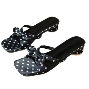 Elegant French style polka dot slide sandals with bow detail and square toe block heel