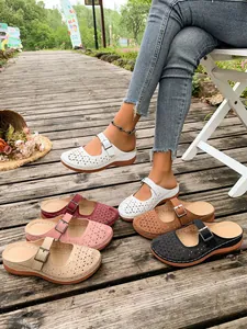 Summer women's hollow-out wedge mules with floral pattern and buckle detail