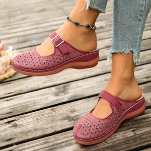 Burgundy hollow-out wedge clogs for women with floral pattern and adjustable buckle strap