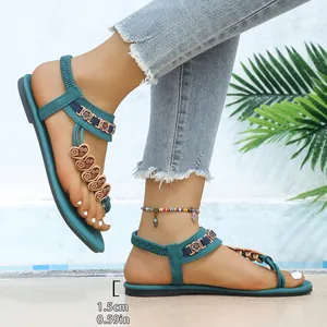 Sandali infradito piatti bohémien color verde acqua con ciondoli a cuore da donna