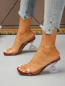 Elegant square toe transparent high heel mule sandals styled with denim jeans