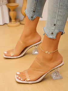 Elegant square toe high heel sandals with clear straps and sculptural wine glass heels