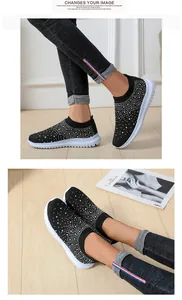 Detailansicht der schwarzen Strass-Sneaker für Damen mit glitzerndem Fly-Knit-Obermaterial