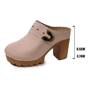 Beige patent leather high heel mules with platform and gold rivet accents