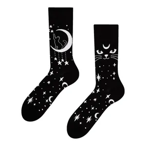 Stylish black and white mismatched cat and moon jacquard crew socks for men and women