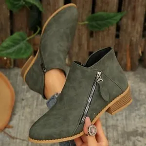 Women's dark green faux leather ankle boots with side zipper and low heel
