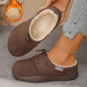 Warm brown winter slippers with plush faux fur lining and adjustable elastic cord