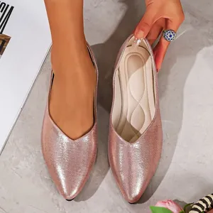 Detailed top view of pink metallic pointed-toe flat shoes with comfortable quilted insoles
