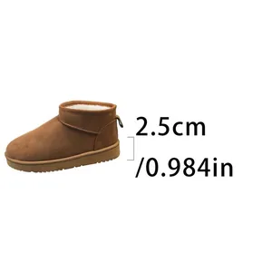 Detail view of classic brown low-ankle snow boots showing the 2.5cm heel height measurement