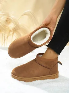 Classic brown snow boots with warm white plush lining