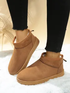 Cozy brown snow boots with plush lining and thick rubber sole for winter