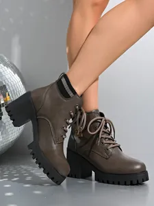 Detailed side view of taupe lace-up chunky heel boots with knit collar