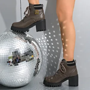 Stylish brown lace-up chunky heel boots for women styled with a large silver disco ball