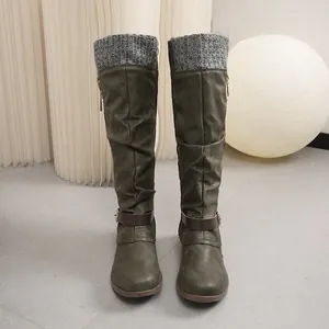 Stylish green slouched knee-high boots with grey knit cuff and ankle buckle