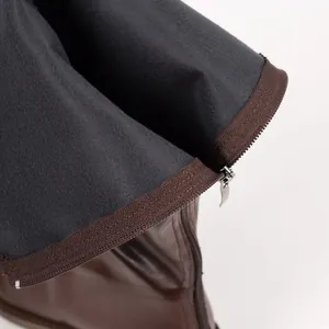 Close-up of brown Martin boot showing soft interior lining and high-quality metal zipper.