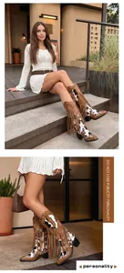 Close-up of Western cow-print fringe boots with studded details and mid-heel