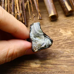 Close-up detail of natural raw crystal agate druzy stone on retro adjustable ring band