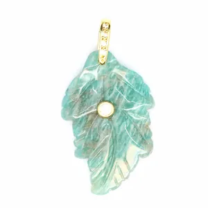 Close-up detail of natural Amazonite stone leaf pendant with gold-plated zircon inlay