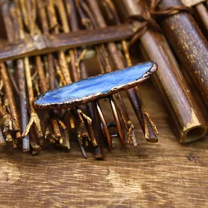 Detailed view of raw blue natural stone ring with rustic copper finish setting.