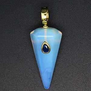Detailed view of a hexagonal opalite cone pendant with a blue gemstone inlay.