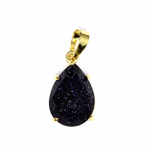 Pendentif en pierre de sable bleue facettée en forme de goutte avec sertissage doré