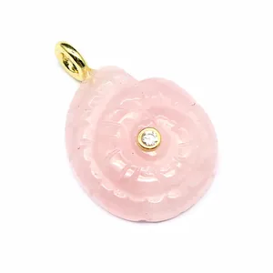 Detail view of a hand-carved pink rose quartz nautilus pendant with zircon accent