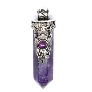 Detail of retro purple crystal hexagonal pillar pendant with ornate silver carving.