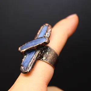 Detailed macro view of vintage medieval style open ring featuring blue kyanite stones