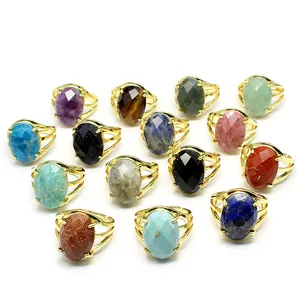 Collection of vintage adjustable rings with faceted oval natural gemstones in gold settings