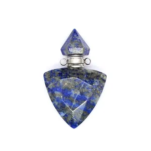 Close-up of a triangular lapis lazuli essential oil bottle pendant with faceted cut