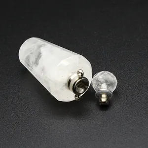 Detailed macro view of white natural stone perfume bottle pendant with open screw cap