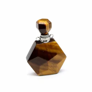Vue détaillée de haute qualité d'un pendentif flacon de parfum en pierre d'oeil de tigre naturelle
