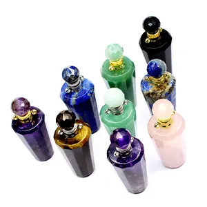 Detailed view of assorted natural stone perfume bottle pendants for aromatherapy jewelry