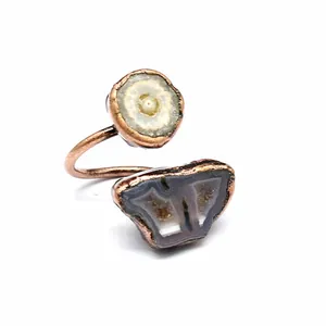 Detailed view of vintage copper open ring with natural agate stone slices