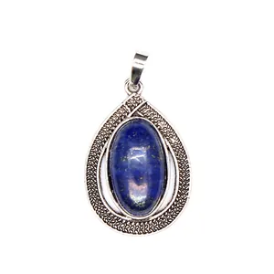 Vintage silver waterdrop pendant featuring an oval blue lapis lazuli gemstone center