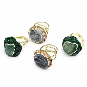 Detailed view of handmade adjustable rings with natural druzy stones and crystals