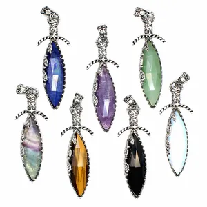 Collection of seven vintage sword pendants featuring faceted natural crystal stones for men