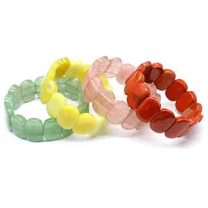 Collection of natural stone oval bead bracelets featuring pink strawberry quartz and green stones