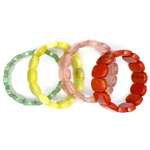 Group of four smooth oval natural gemstone bracelets in assorted vibrant colors