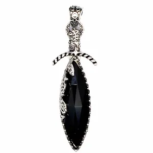 Detailed view of vintage silver gothic sword pendant with large black marquise cut crystal