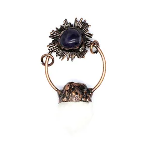 Unique vintage copper pendant featuring dark amethyst and raw white quartz crystal point