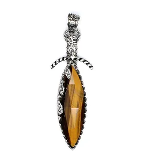 Detailed view of sword pendant necklace with natural faceted tiger eye stone