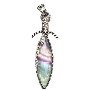 Detailed view of gothic natural fluorite crystal sword pendant with silver leaf motif