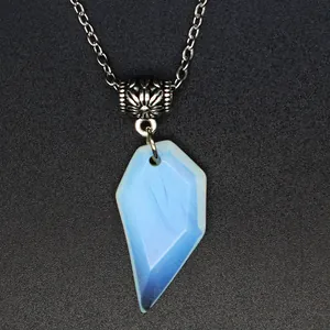 Detailed close-up of a faceted blue and white marbled heart fragment stone pendant