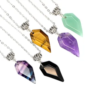 Close-up of faceted natural stone pendant necklaces in various colorful crystal variants